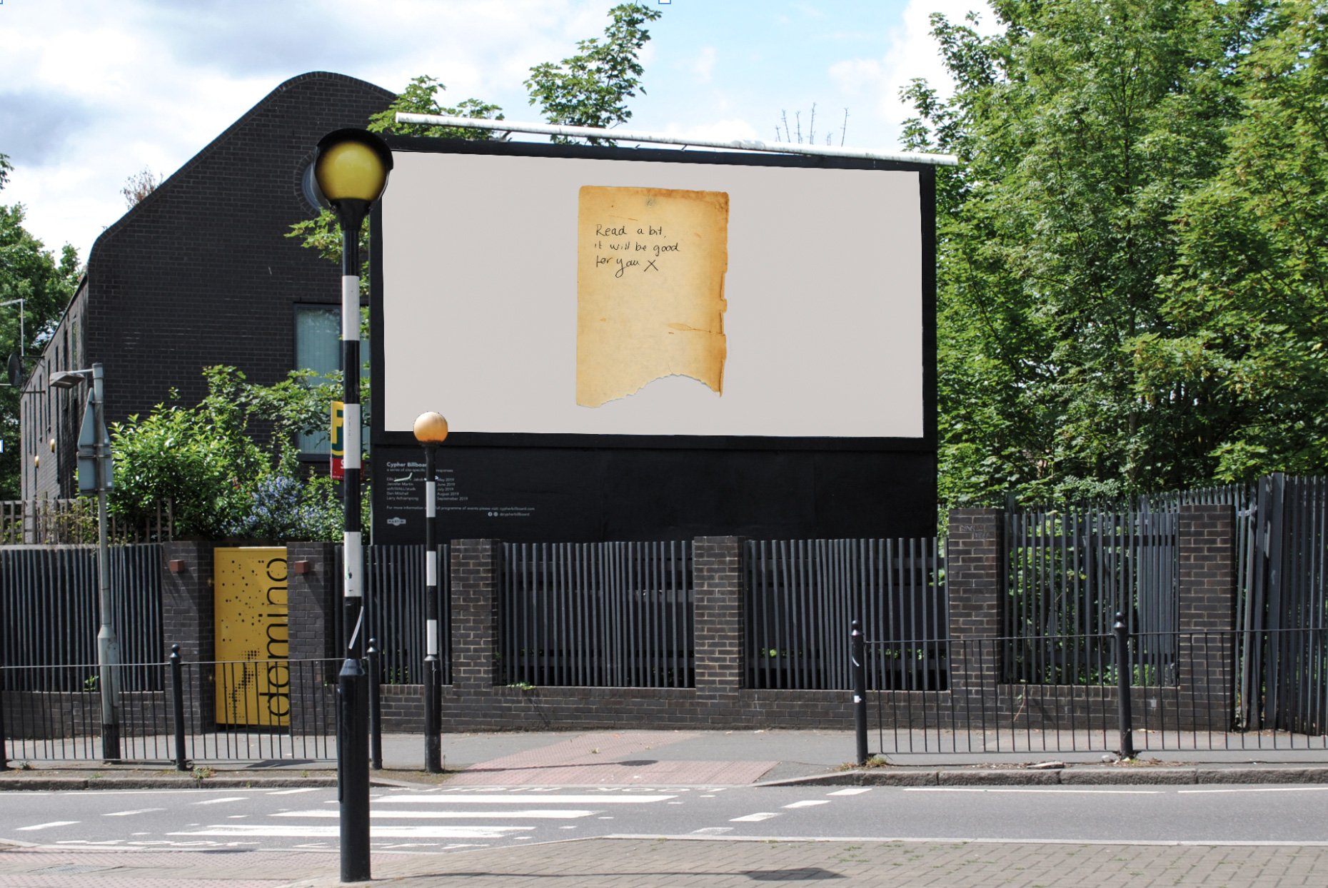 A handwritten message displayed on a roadside billboard