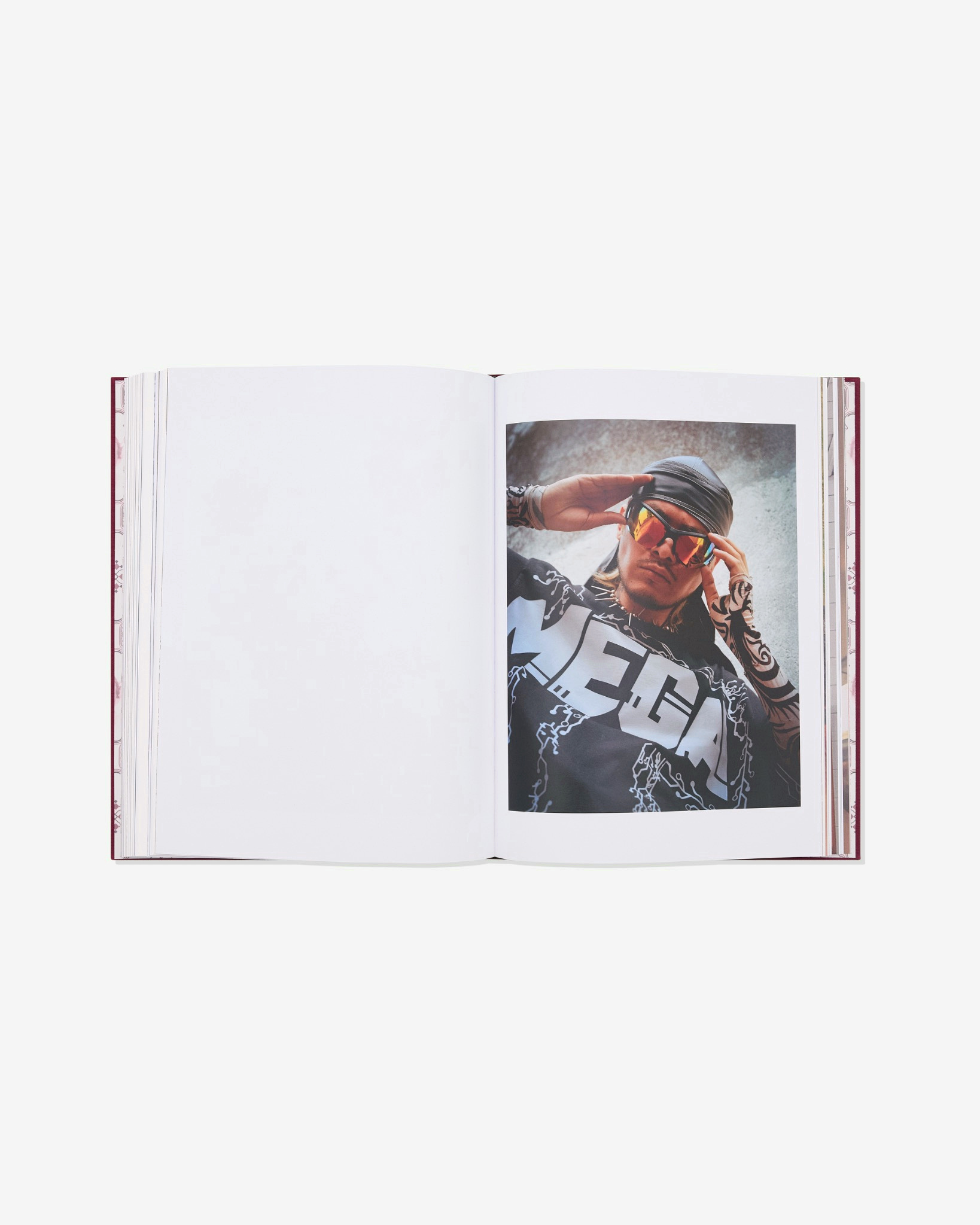 Open book showing a portrait spread from A Caged Dog Barks the Fiercest.