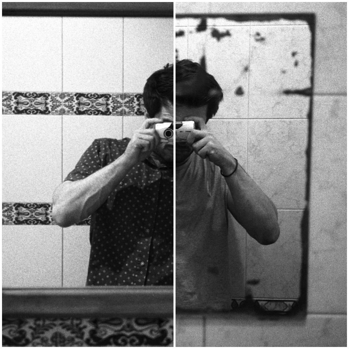 Black-and-white photograph: a self-portrait reflected across a divided mirror.