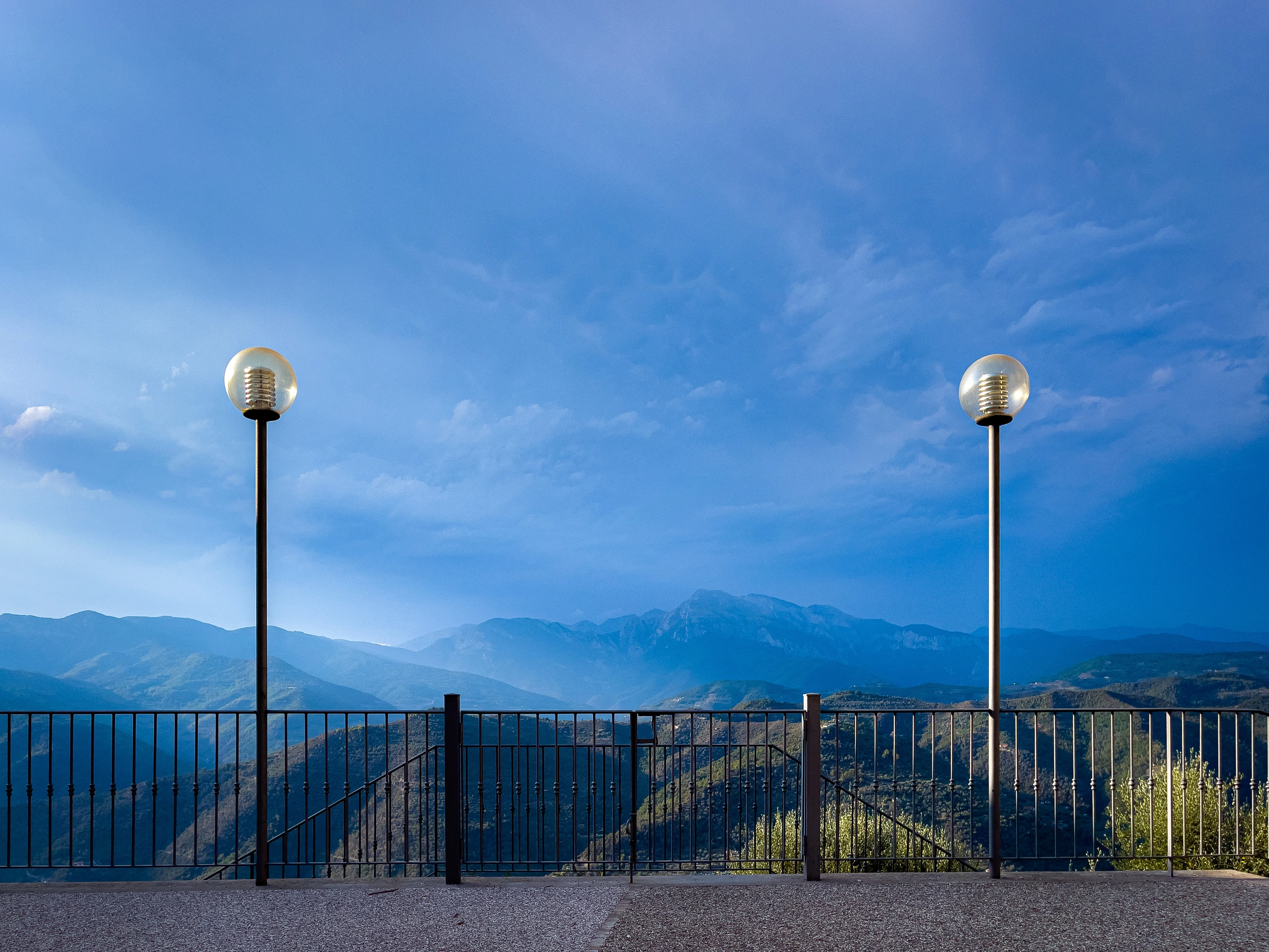 Lamps overlooking mountains.