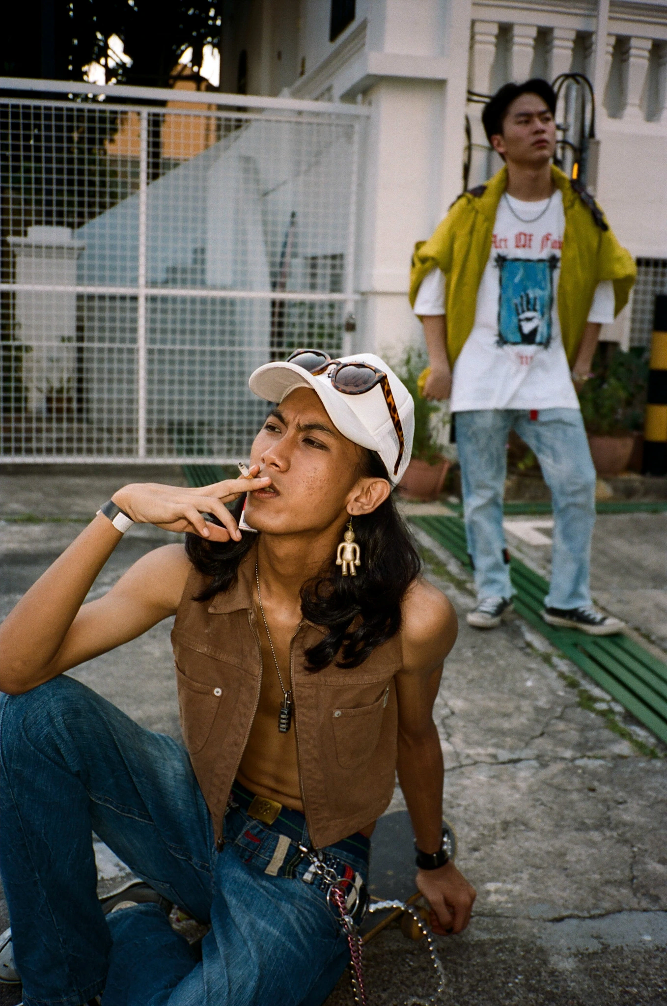 Young people outside building.