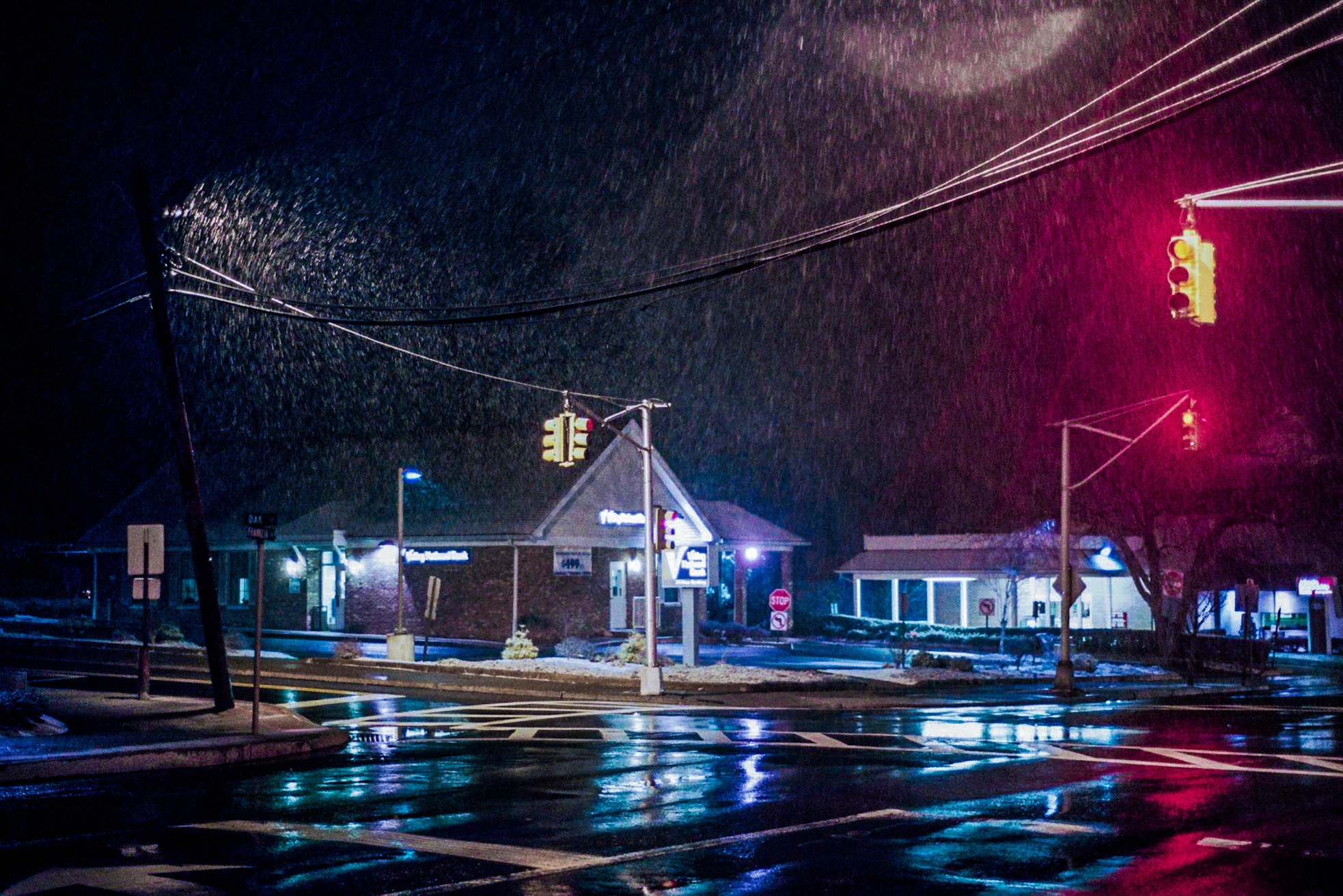 Wet junction at night.