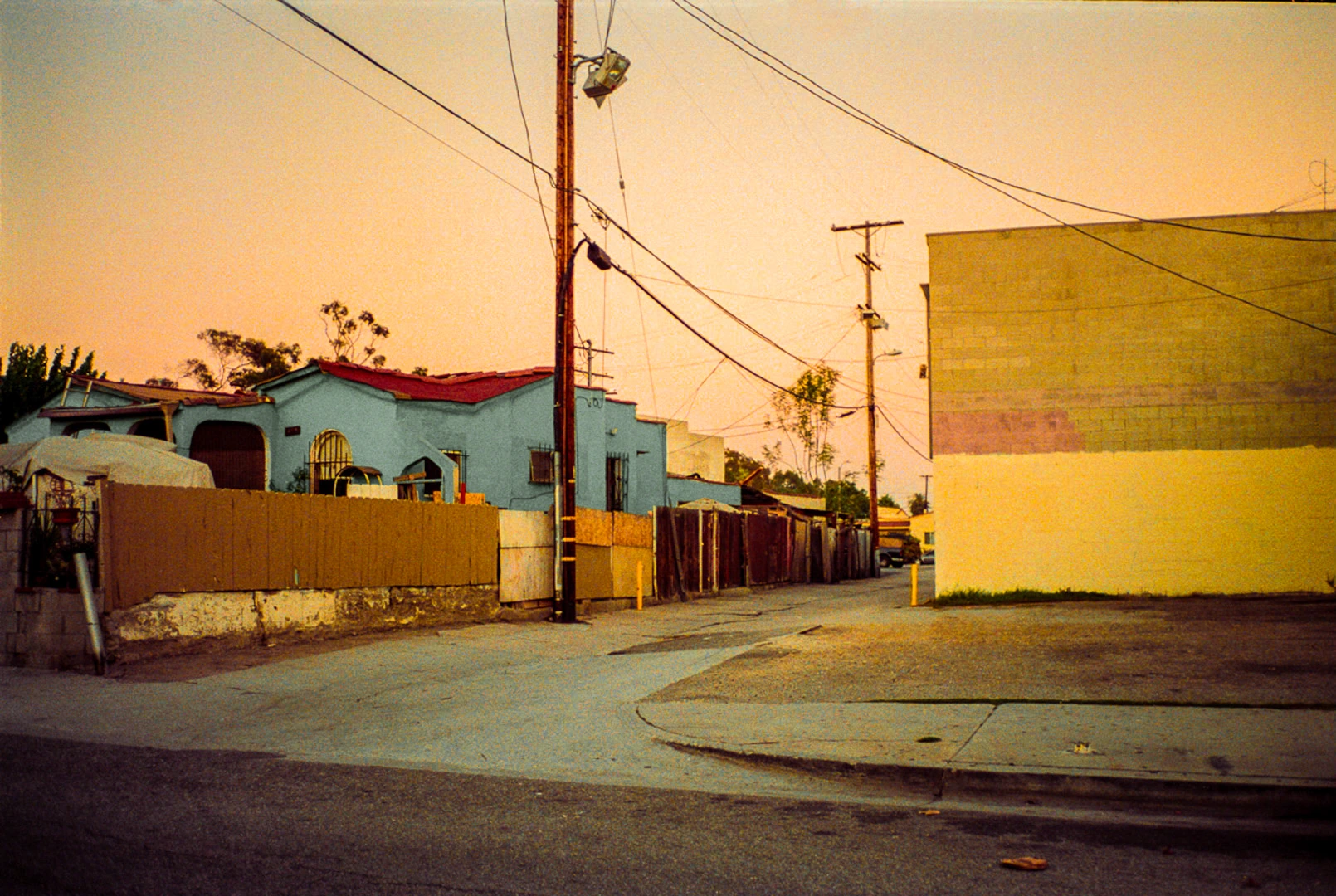 Colourful houses at street corner.
