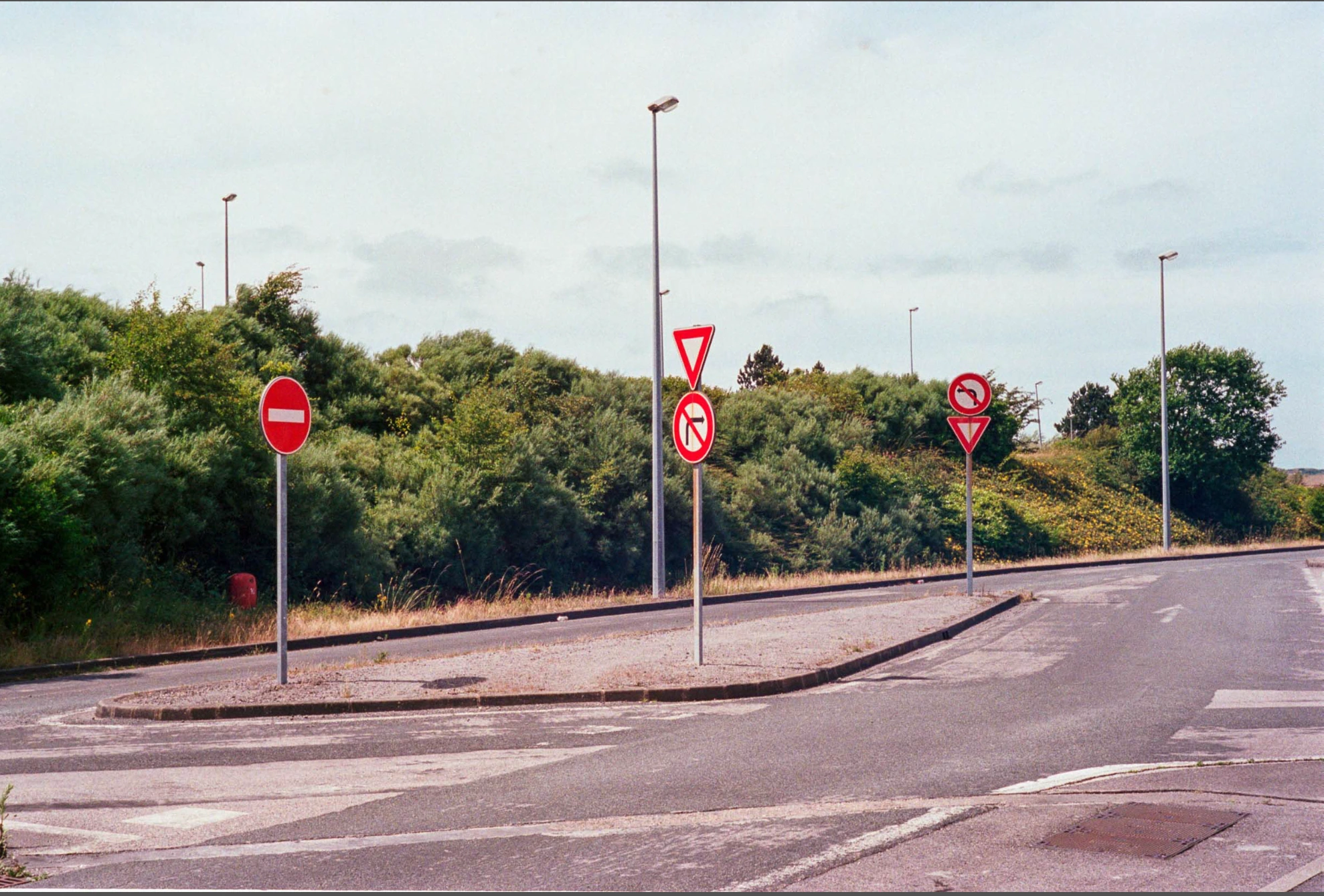 Road junction and traffic signs.