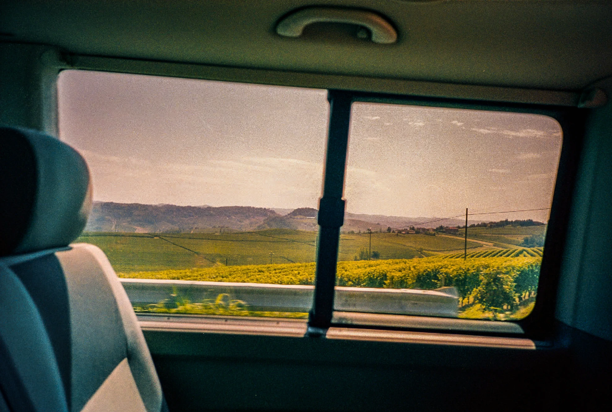 Landscape through car window.