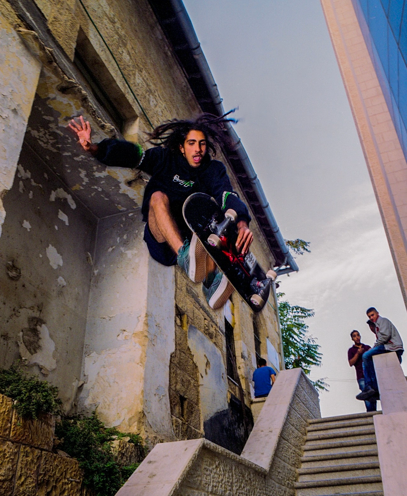 Young man on outdoor stairway.