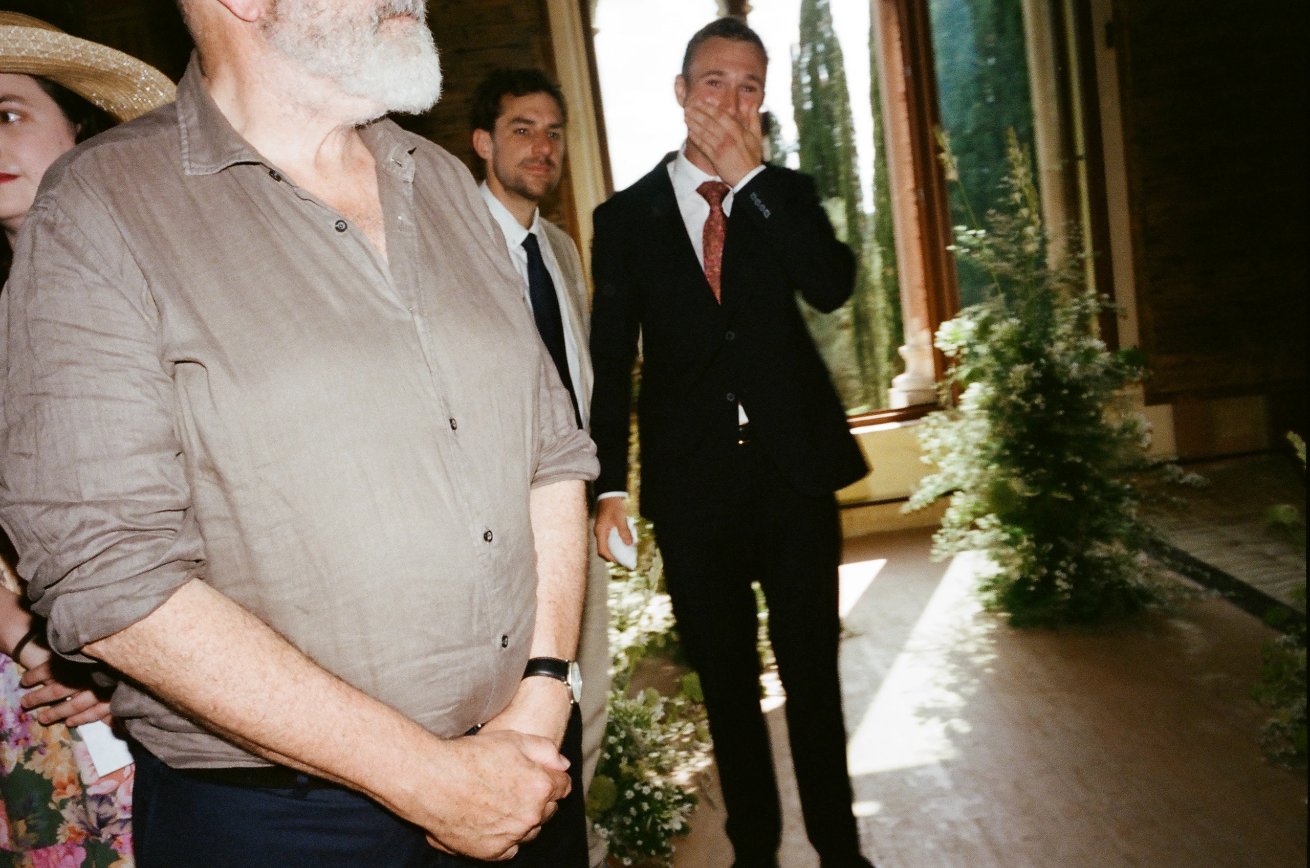 Guests in formal clothing.