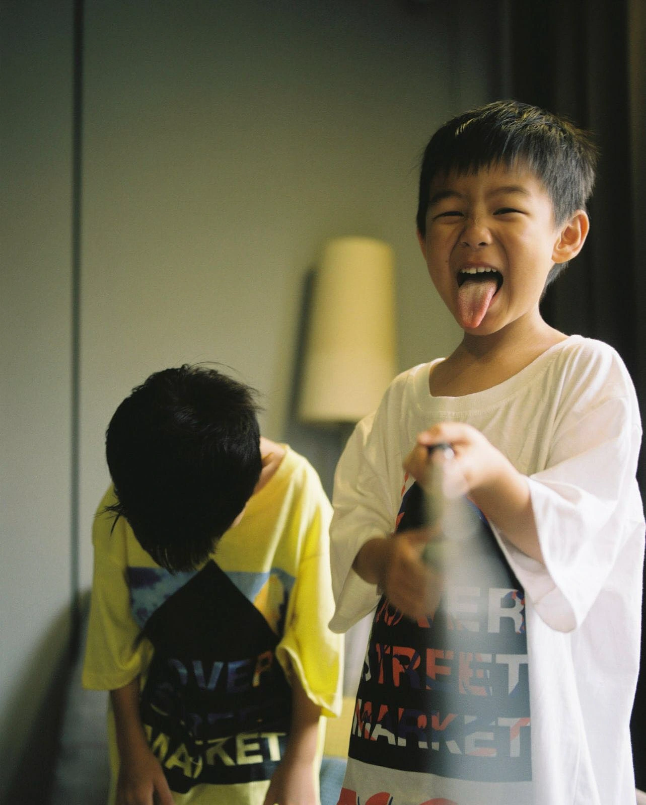 Laughing child indoors.