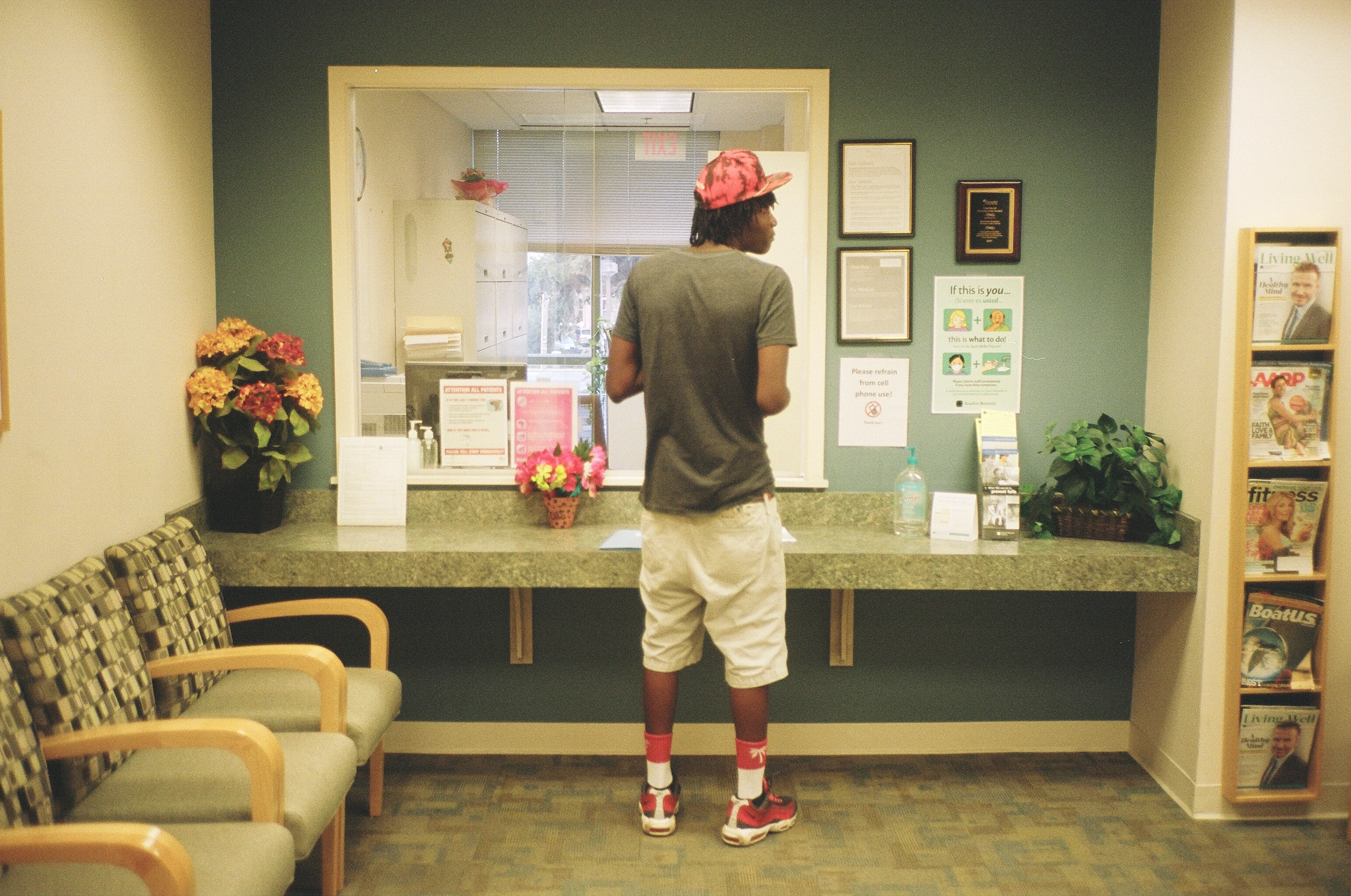 Man at reception counter.